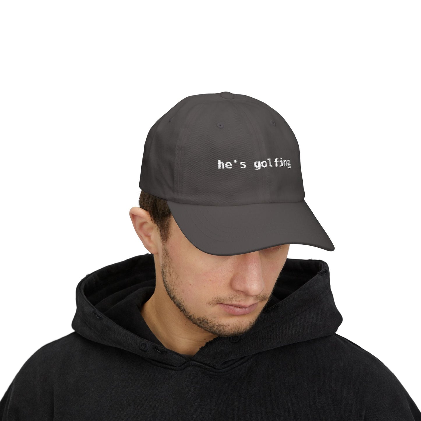 He's Golfing 🧢 Funny Golf Dad Hat — Gift for Him