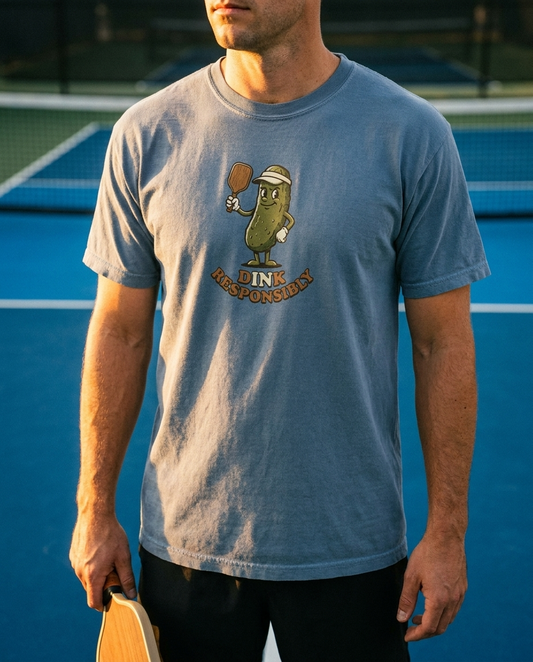 Dink Responsibly pickleball tee Blue Jean close up on court