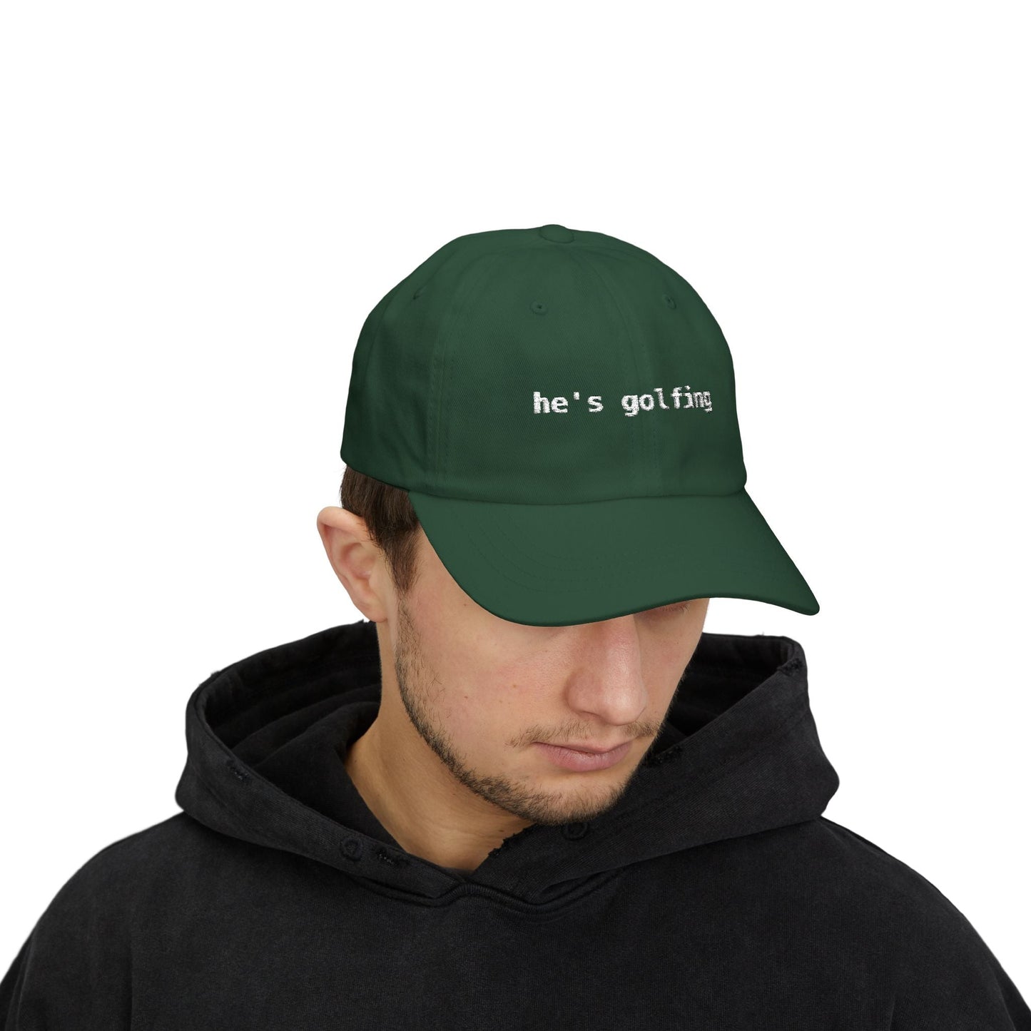 He's Golfing 🧢 Funny Golf Dad Hat — Gift for Him