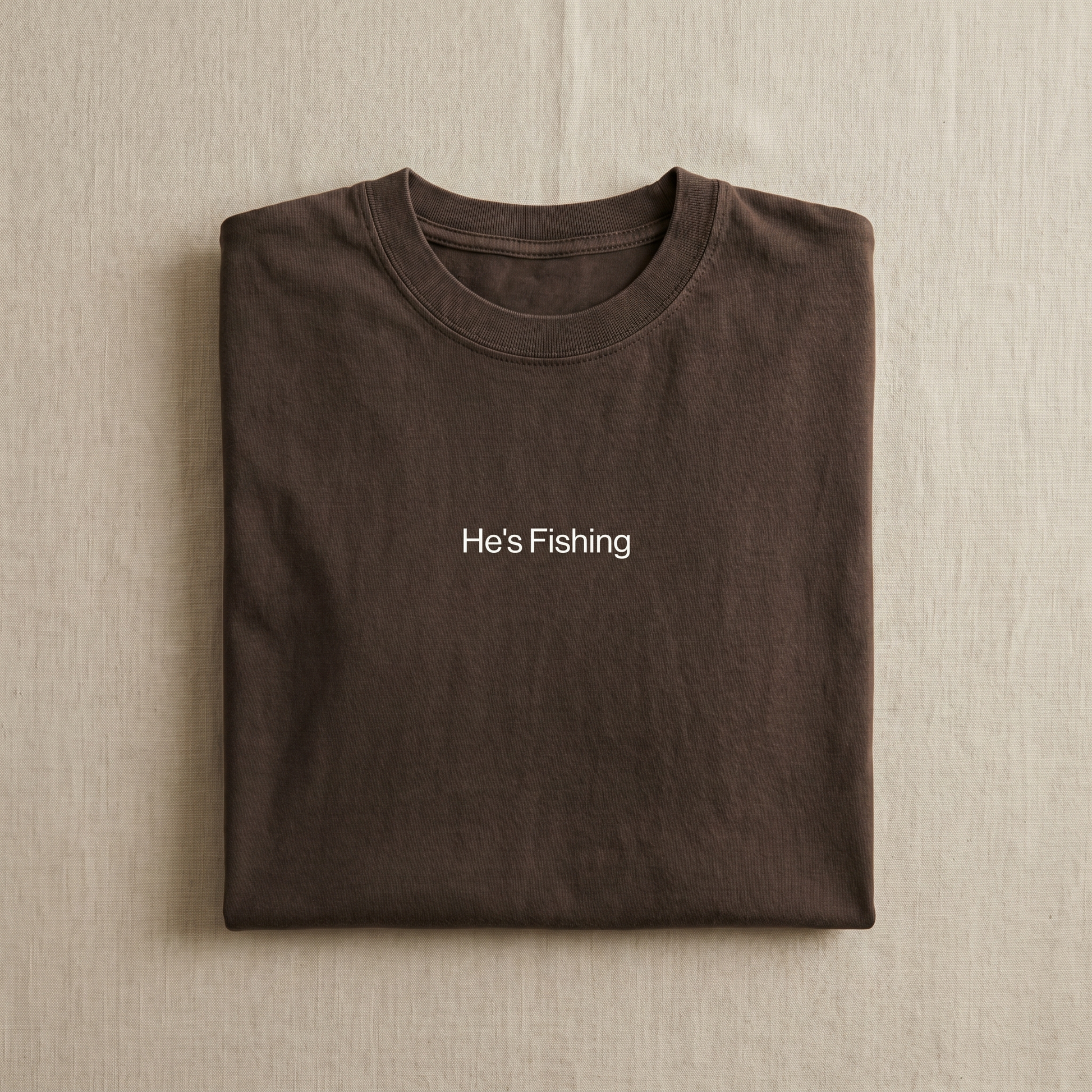 He's Fishing - espresso tee with minimal white text