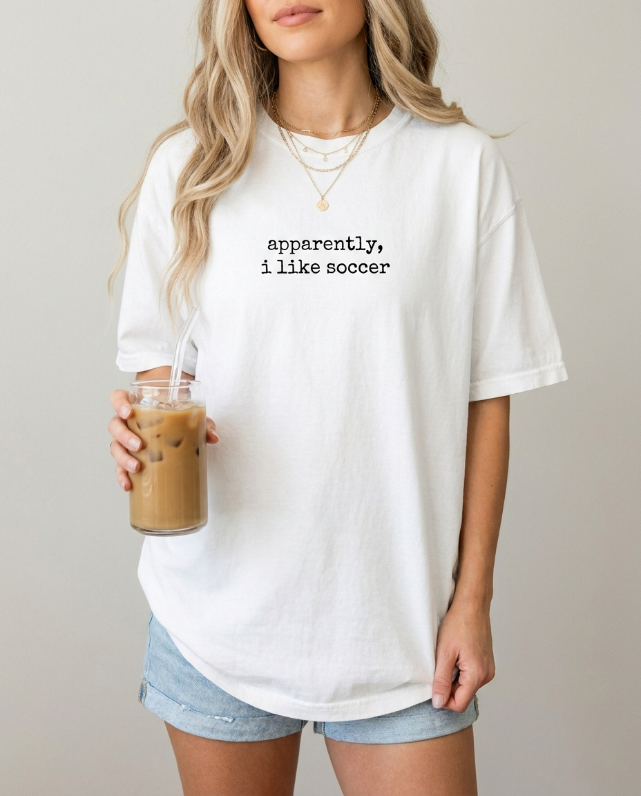 Woman in white apparently i like soccer tee