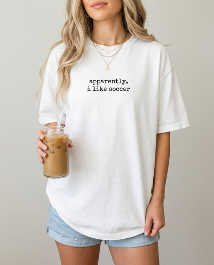 Woman in white apparently i like soccer tee