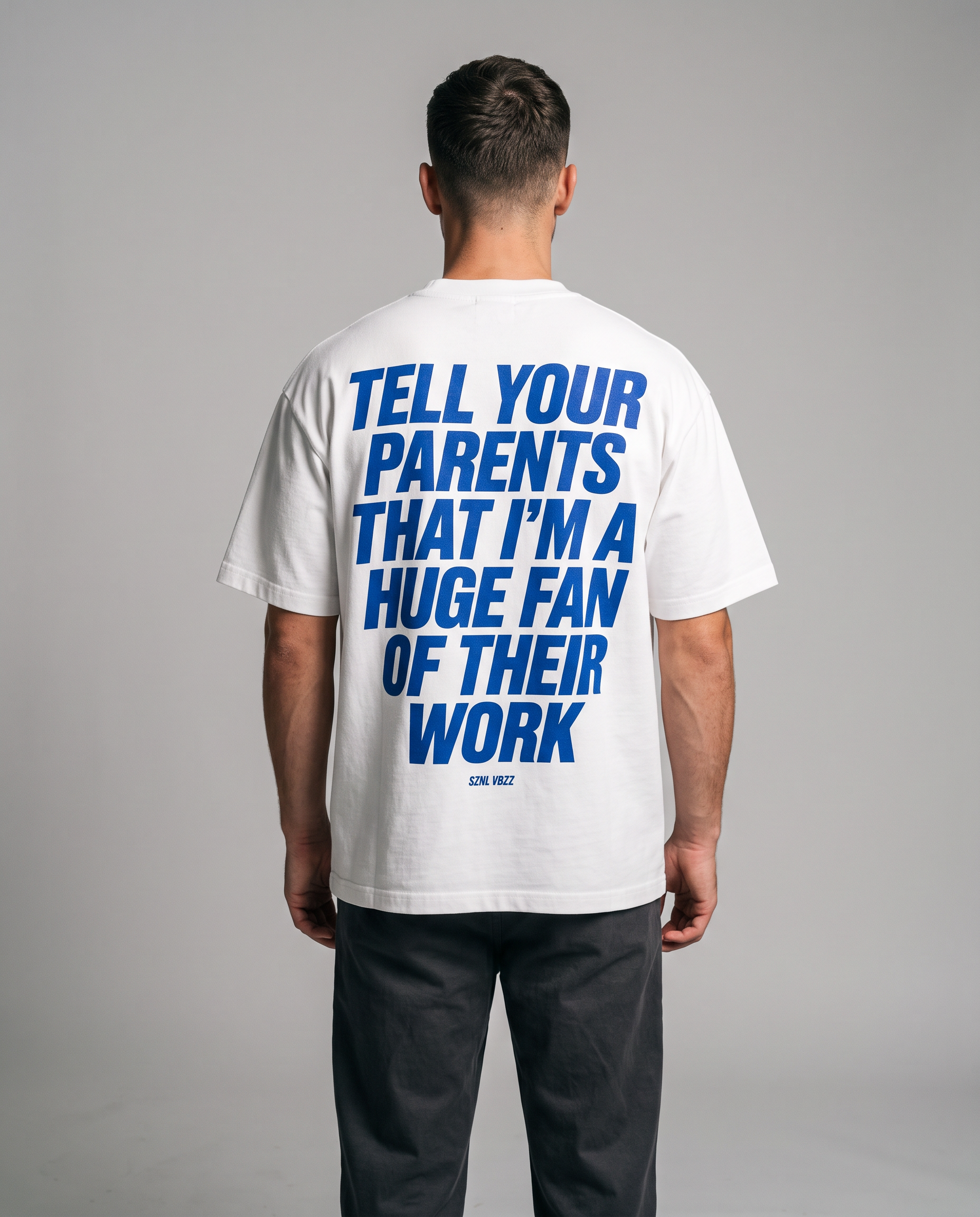 Studio back view of the Tell Your Parents oversized tee