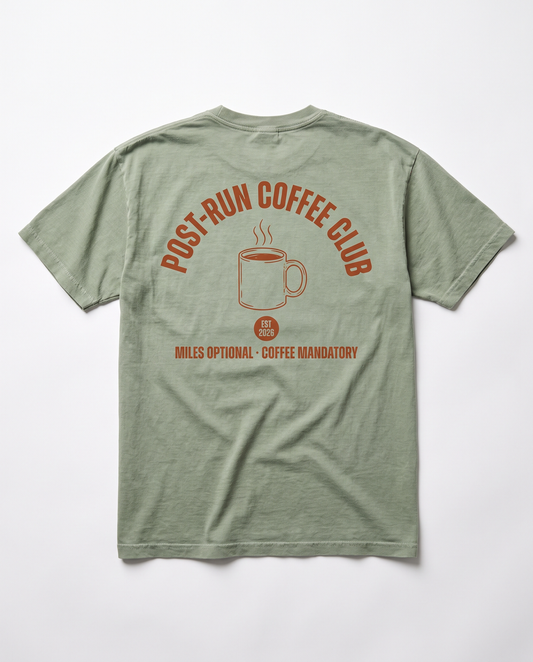 Post-Run Coffee Club tee — terracotta back print on sage Comfort Colors tee, flat lay