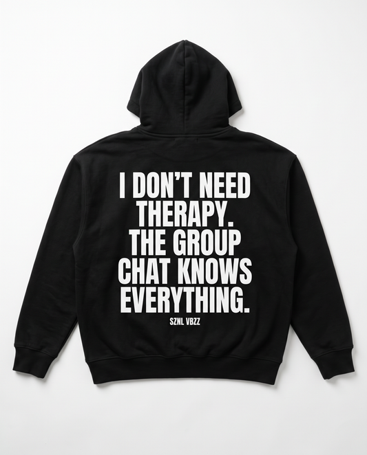 I Don't Need Therapy hoodie — white back print on black heavyweight pullover, flat lay