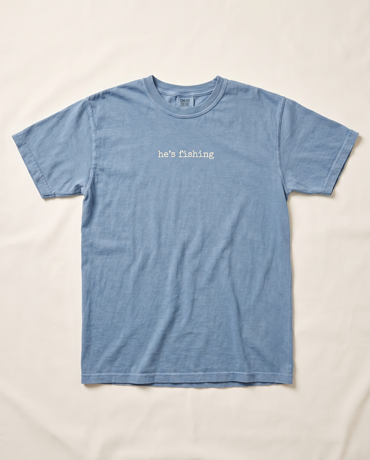 He's Fishing tee, blue jean flat lay