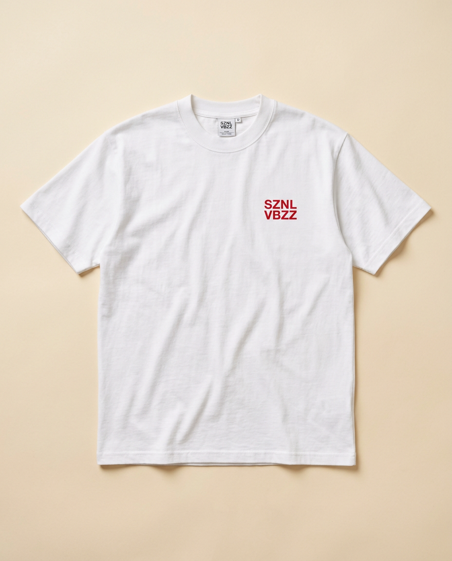 Front of the white tee with small red SZNL VBZZ chest mark, flat lay
