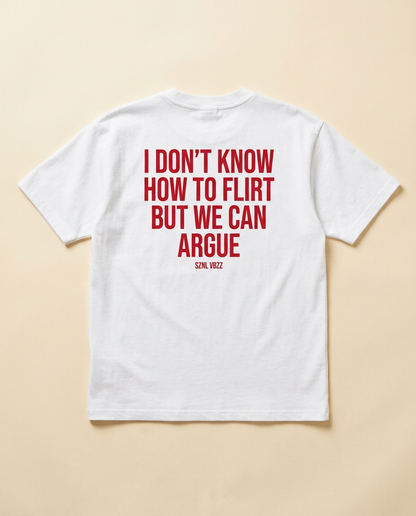 I Don't Know How to Flirt But We Can Argue tee, red back print on white, flat lay
