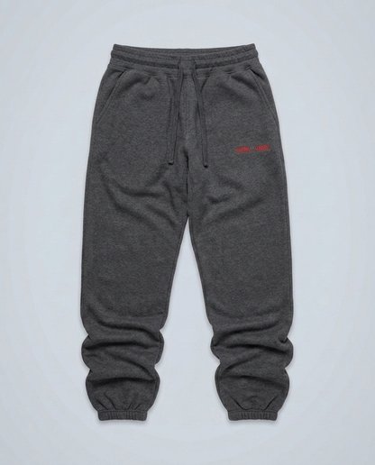 SZNL VBZZ embroidered sweatpants, carbon grey, oversized fit, red hip stitch, studio flat lay