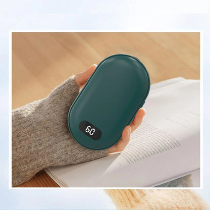 Hand warmer held in a gloved hand